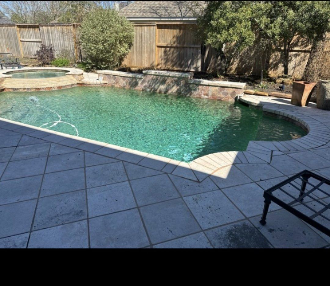 Dated pool with old coping before remodel